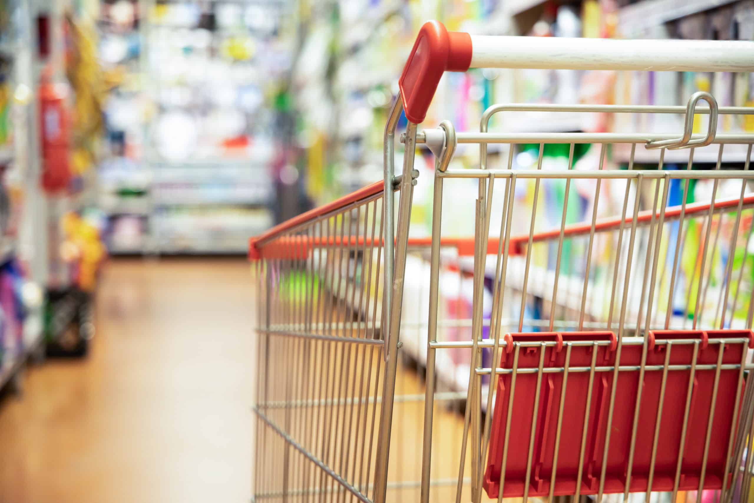 Shopping cart in a grocery story aisle